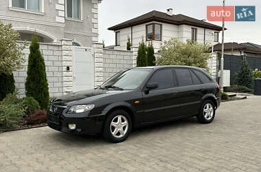 Хэтчбек Mazda 323 2003 в 