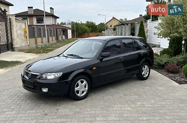 Хэтчбек Mazda 323 2003 в 
