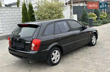 Хэтчбек Mazda 323 2003 в 