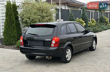 Хэтчбек Mazda 323 2003 в 