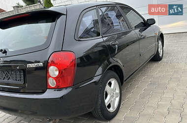 Хэтчбек Mazda 323 2003 в 
