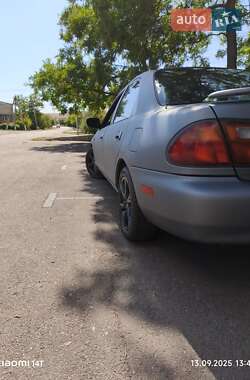 Седан Mazda 323 1996 в 