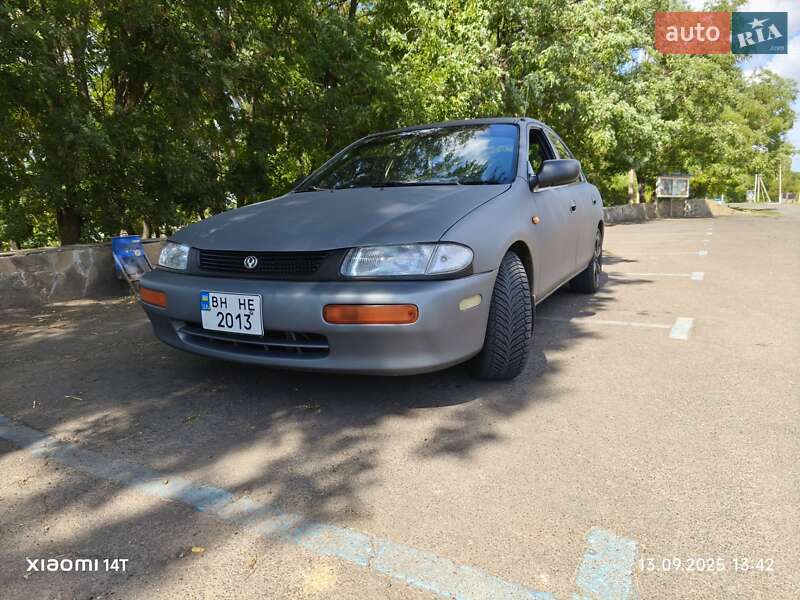 Седан Mazda 323 1996 в 