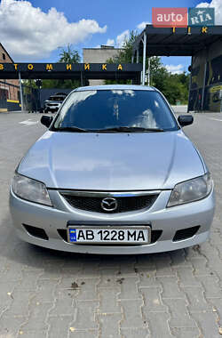 Хэтчбек Mazda 323 2002 в 