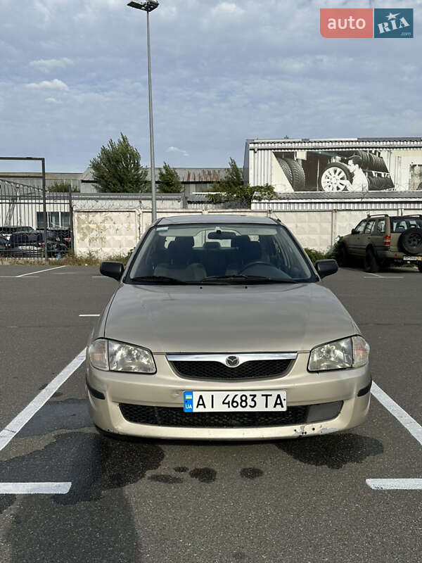 Седан Mazda 323 1999 в Киеве