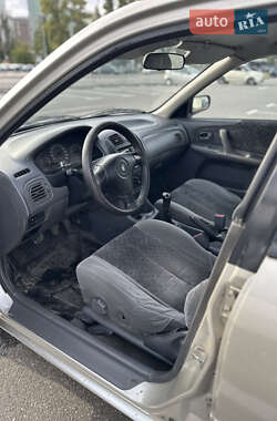 Седан Mazda 323 1999 в 