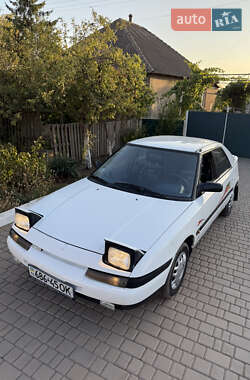 Хэтчбек Mazda 323 1990 в 