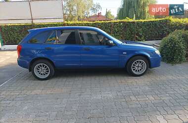 Хэтчбек Mazda 323 2003 в 