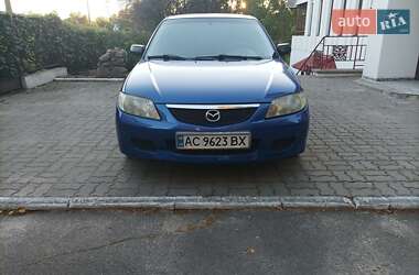 Хэтчбек Mazda 323 2003 в 