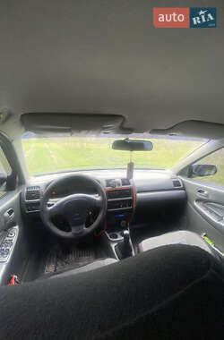 Седан Mazda 323 1997 в 