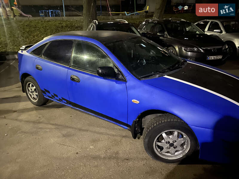 Хетчбек Mazda 323 1997 в Хмельницькому фото 9 Хетчбек Mazda 323 1997 в Хмельницькому