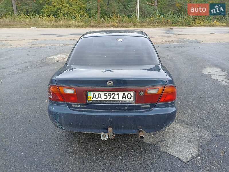 Седан Mazda 323 1995 в Богуславе фото 2 Седан Mazda 323 1995 в Богуславе