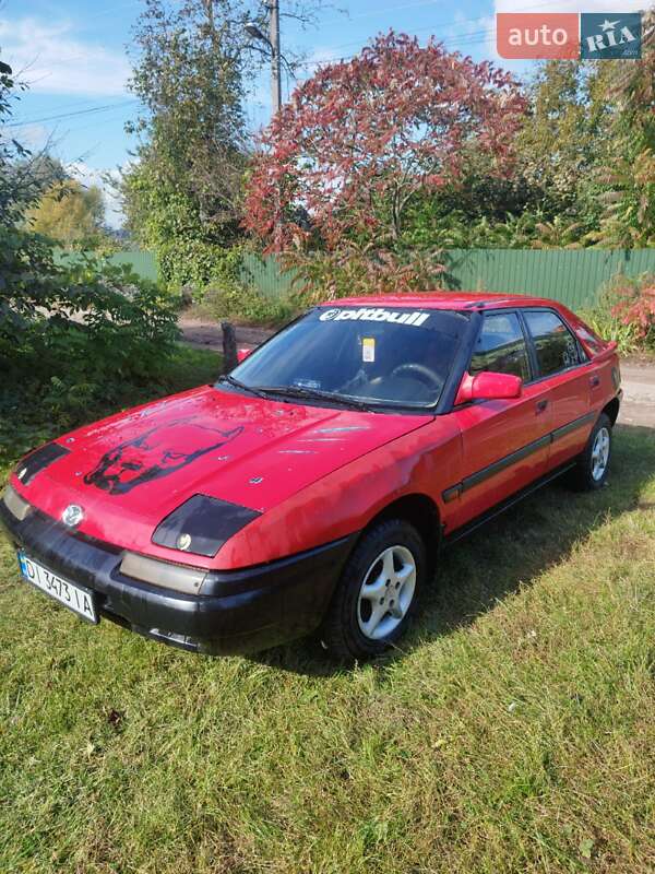 Хэтчбек Mazda 323 1994 в Нововолынске фото 3 Хэтчбек Mazda 323 1994 в Нововолынске