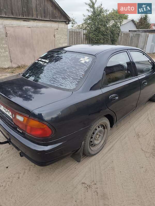 Седан Mazda 323 1998 в Змиеве