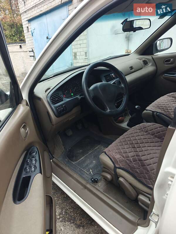 Седан Mazda 323 1996 в Днепре фото 4 Седан Mazda 323 1996 в Днепре