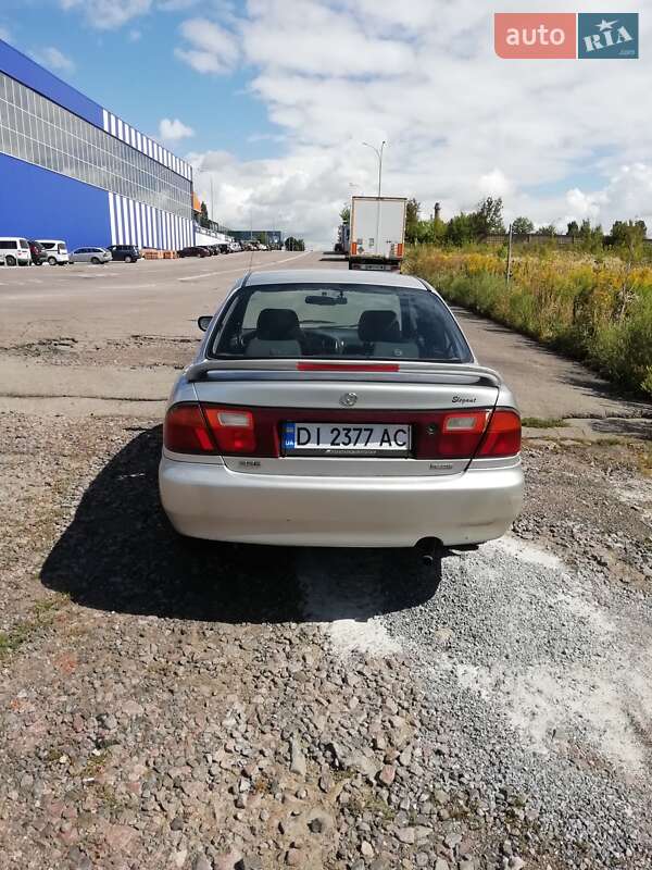 Седан Mazda 323 1996 в Ровно фото 11 Седан Mazda 323 1996 в Ровно