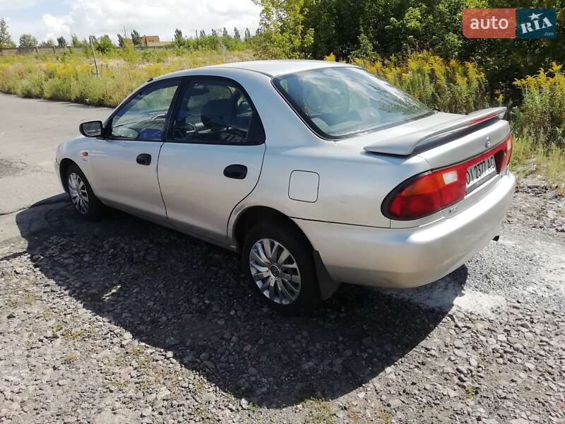 Седан Mazda 323 1996 в Ровно фото 12 Седан Mazda 323 1996 в Ровно