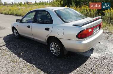 Седан Mazda 323 1996 в  фото 12 Седан Mazda 323 1996 в