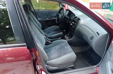 Седан Mazda 323 1999 в 
