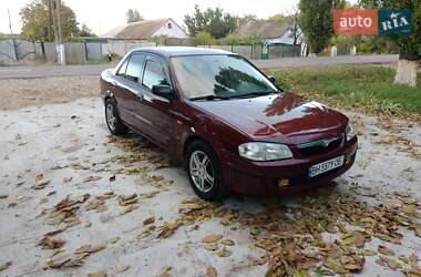 Седан Mazda 323 1999 в 