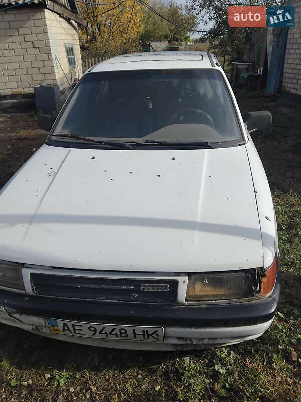 Седан Mazda 323 1991 в Солоному фото Седан Mazda 323 1991 в Солоному