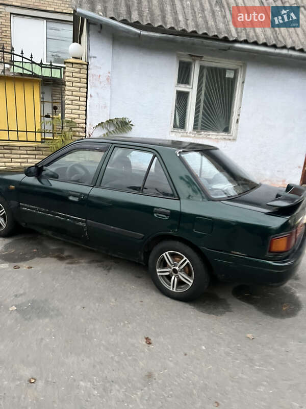 Седан Mazda 323 1994 в Ирпене фото 5 Седан Mazda 323 1994 в Ирпене