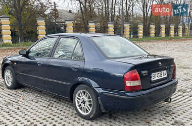 Седан Mazda 323 1999 в 
