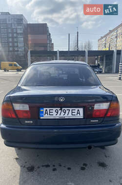 Седан Mazda 323 1997 в 