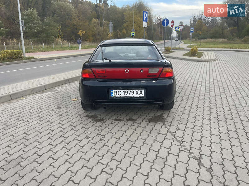 Хэтчбек Mazda 323 1995 в Львове фото 4 Хэтчбек Mazda 323 1995 в Львове