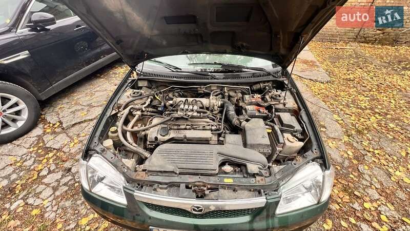 Хетчбек Mazda 323 1999 в Києві фото 18 Хетчбек Mazda 323 1999 в Києві