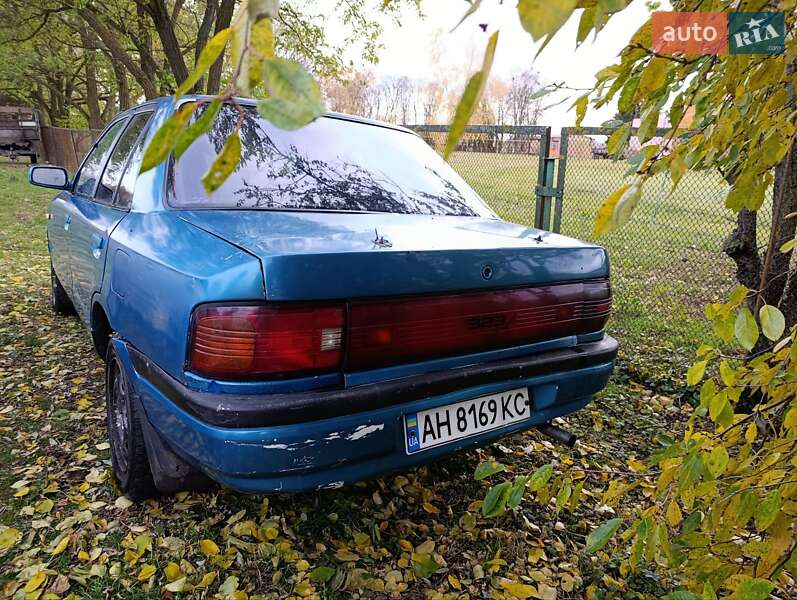 Седан Mazda 323 1995 в Сумах