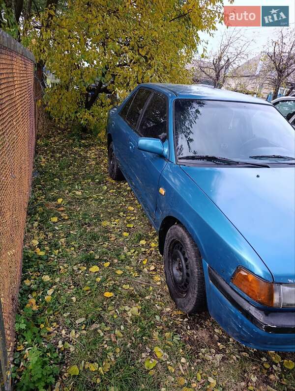 Седан Mazda 323 1995 в Сумах