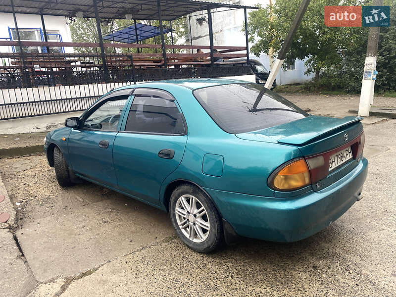 Седан Mazda 323 1998 в Одесі фото 27 Седан Mazda 323 1998 в Одесі
