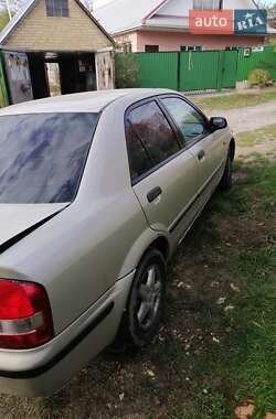 Седан Mazda 323 1999 в Киеве