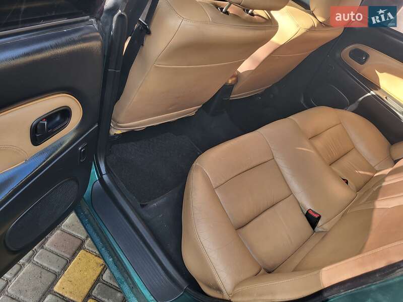 Хетчбек Mazda 323 1998 в Подільську фото 4 Хетчбек Mazda 323 1998 в Подільську
