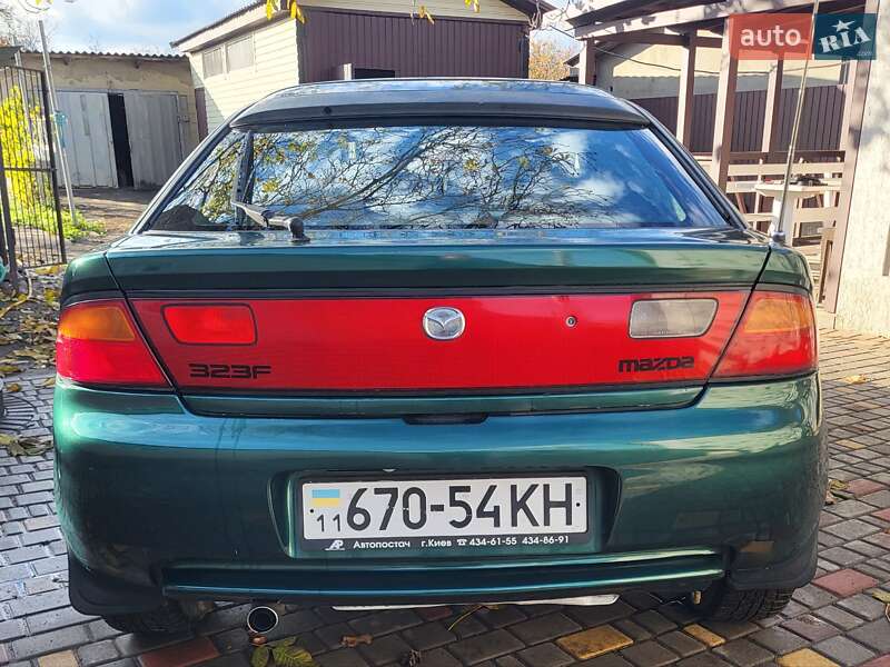 Хетчбек Mazda 323 1998 в Подільську фото 9 Хетчбек Mazda 323 1998 в Подільську