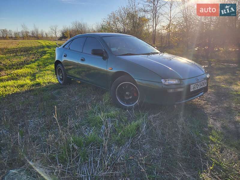 Хэтчбек Mazda 323 1998 в Подольске фото 14 Хэтчбек Mazda 323 1998 в Подольске