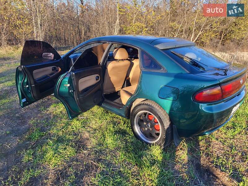 Хэтчбек Mazda 323 1998 в Подольске фото 17 Хэтчбек Mazda 323 1998 в Подольске