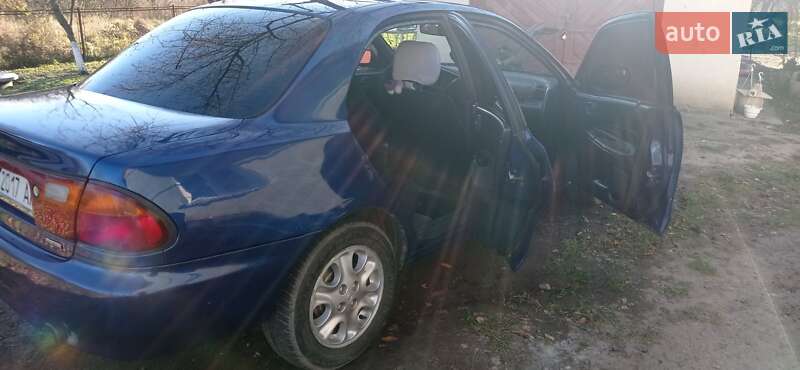 Седан Mazda 323 1996 в Коломые фото 11 Седан Mazda 323 1996 в Коломые