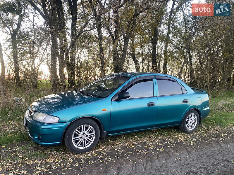 Седан Mazda 323 1998 в Одесі фото 31 Седан Mazda 323 1998 в Одесі