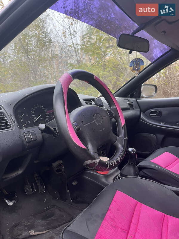 Хэтчбек Mazda 323 1994 в Вышгороде фото 18 Хэтчбек Mazda 323 1994 в Вышгороде