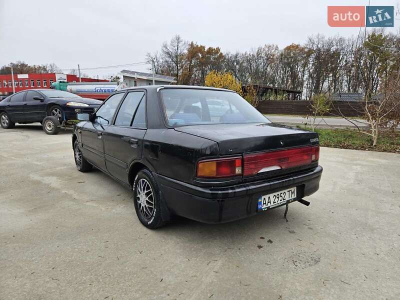 Седан Mazda 323 1995 в Обухове фото 12 Седан Mazda 323 1995 в Обухове