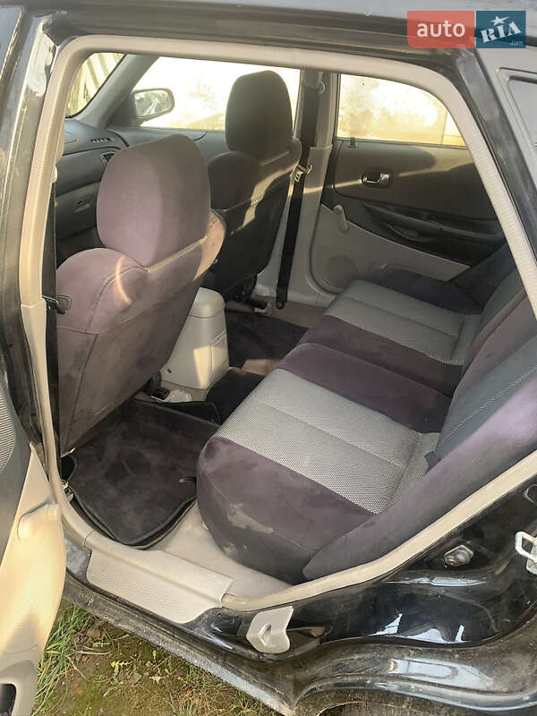 Хетчбек Mazda 323 2003 в Ужгороді фото 8 Хетчбек Mazda 323 2003 в Ужгороді