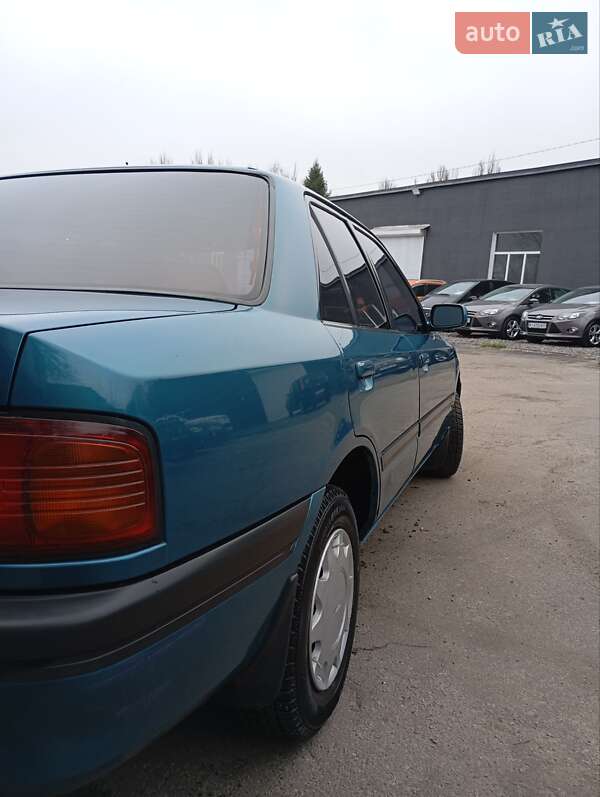 Седан Mazda 323 1995 в Кам'янському