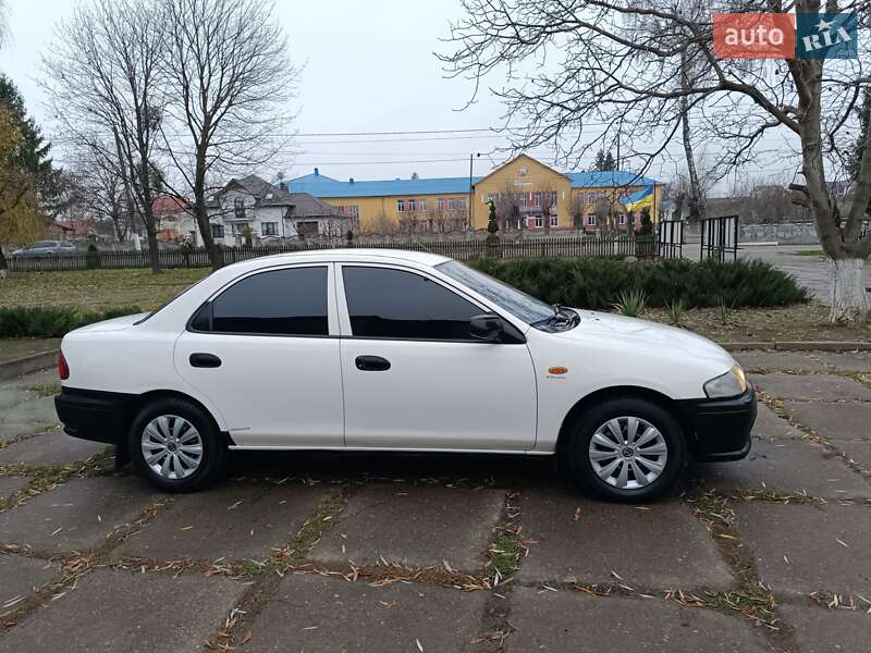 Седан Mazda 323 1998 в Чернівцях фото 7 Седан Mazda 323 1998 в Чернівцях