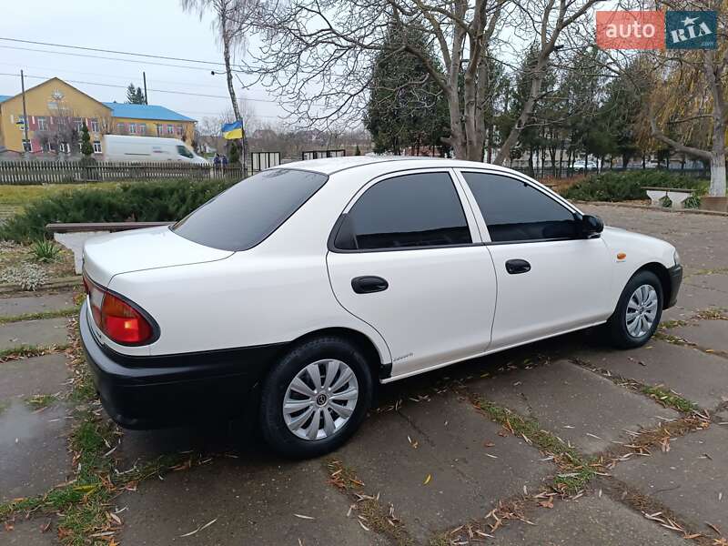 Седан Mazda 323 1998 в Чернівцях фото 10 Седан Mazda 323 1998 в Чернівцях