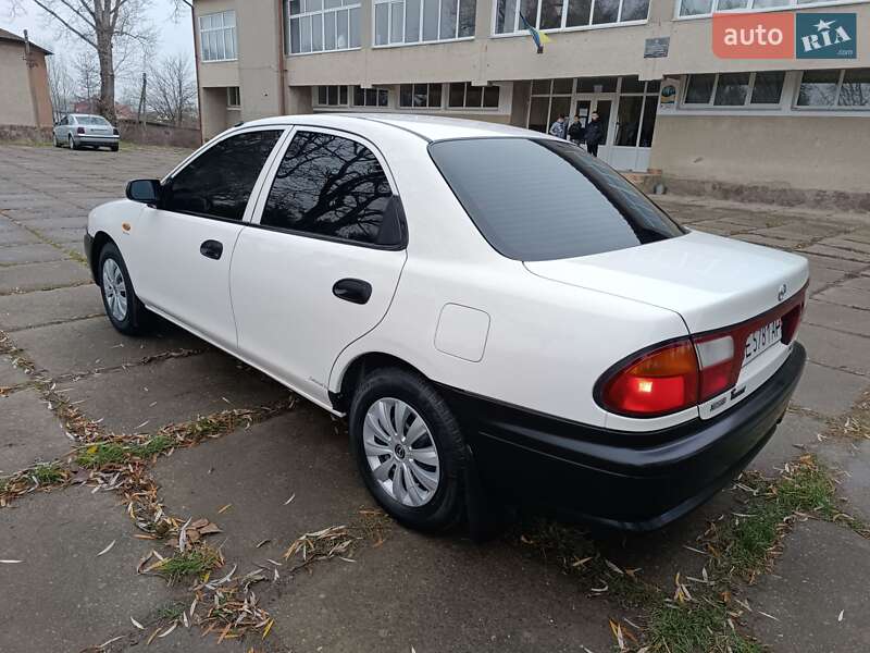 Седан Mazda 323 1998 в Чернівцях фото 15 Седан Mazda 323 1998 в Чернівцях