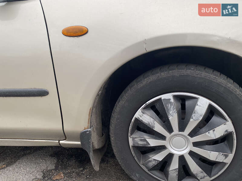 Седан Mazda 323 1996 в Кременчуці фото 5 Седан Mazda 323 1996 в Кременчуці