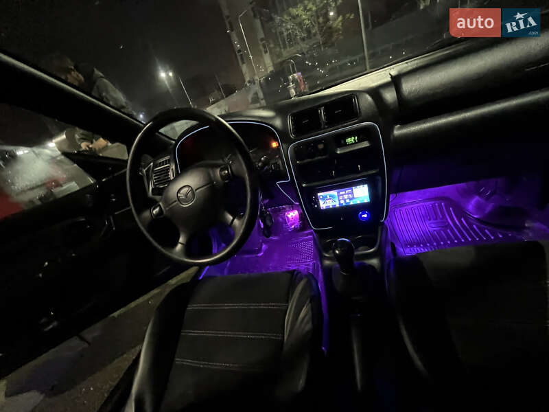 Хэтчбек Mazda 323 1997 в Киеве фото 10 Хэтчбек Mazda 323 1997 в Киеве