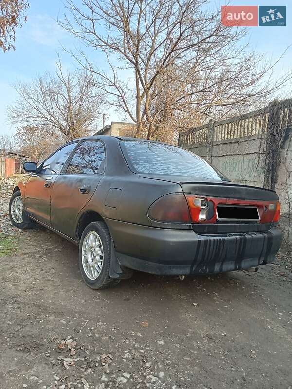 Седан Mazda 323 1995 в Одесі фото Седан Mazda 323 1995 в Одесі